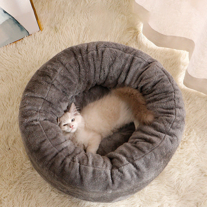 Why Your Pet Deserves the Long Plush Round Pet Bed